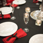 Red and black table setting rentals in Nevada County CA