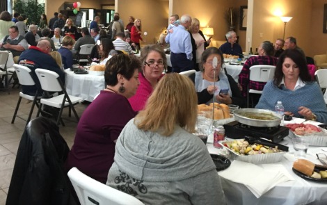 Attendees enjoy authentic Italian cuisine at the first annual Bagna Cauda