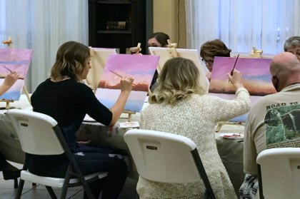 Painters at a past Come Paint With Us class